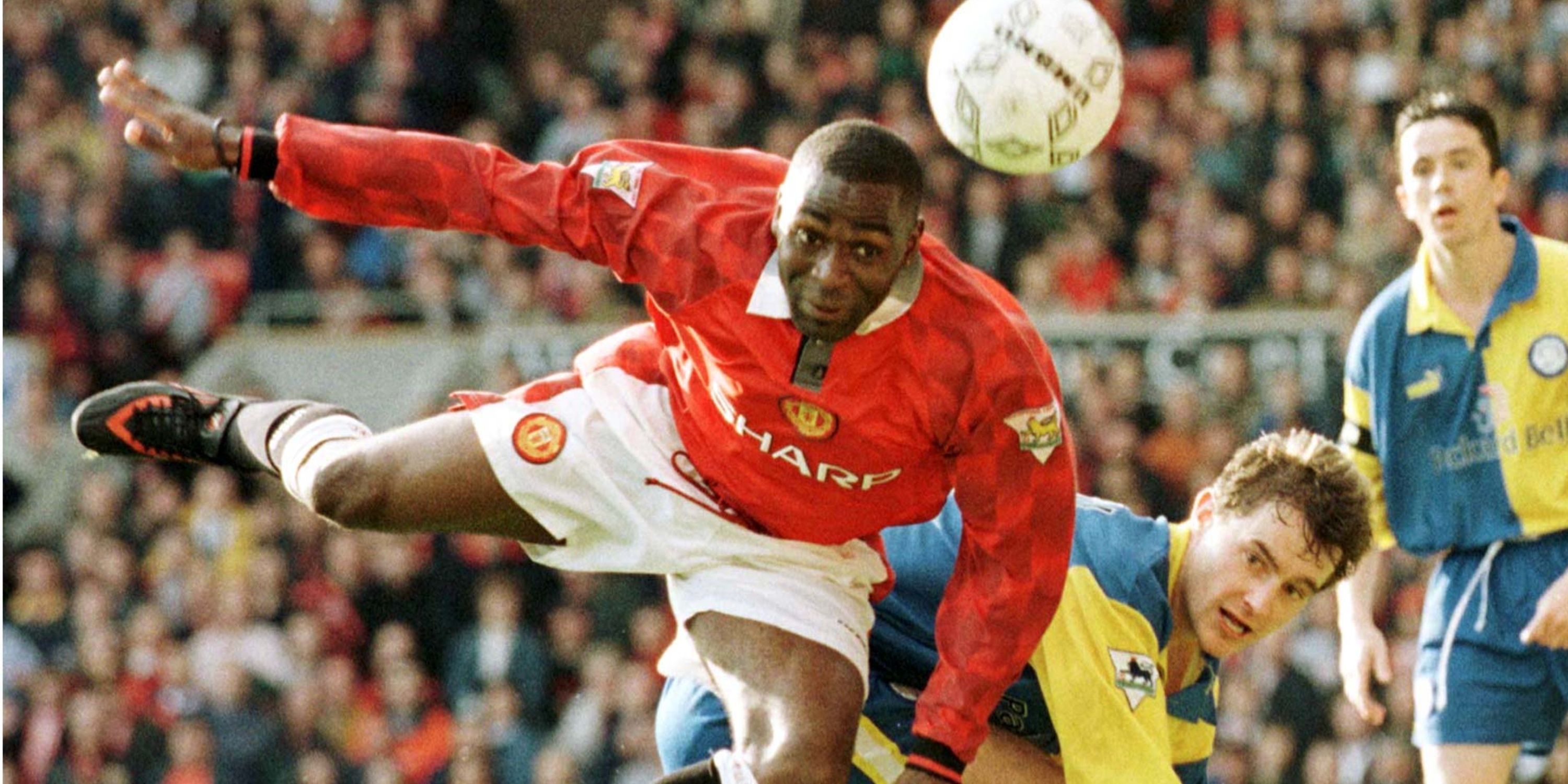 Man Utd's Andy Cole with a header