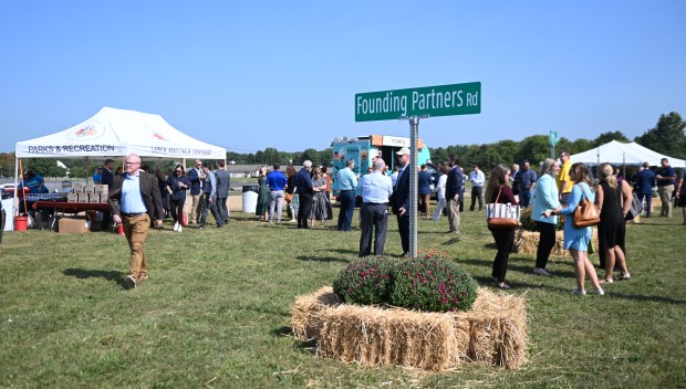 People gather for the groundbreaking ceremony Thursday, Sept.12, 2024, of...