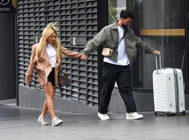 Awhina Rutene and Adrian Araouzou, who are tipped to be next year's fan favourites, were spotted leaving with a suitcase in tow, holding hands before getting into an Uber together