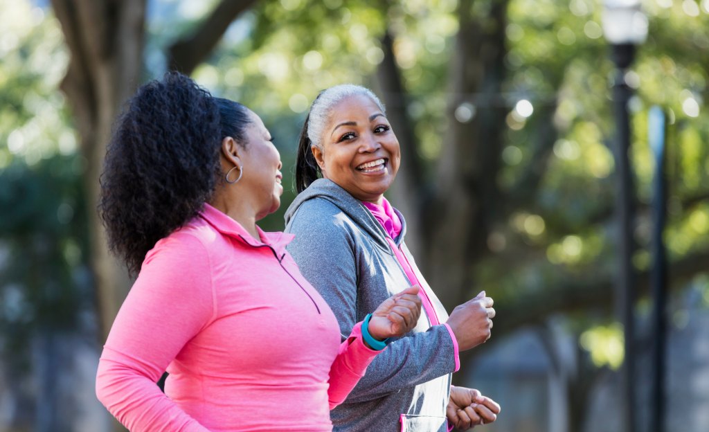 mature women walking outdoors to prevent diabetes