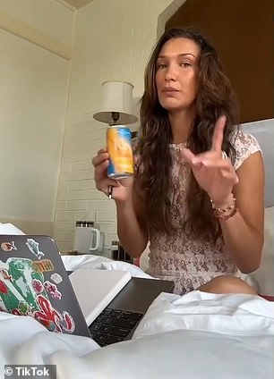 The model also opened a can of her Kin Euphorics drink which she enjoys 'first thing in the morning' and sipped on the flavor Actual Sunshine