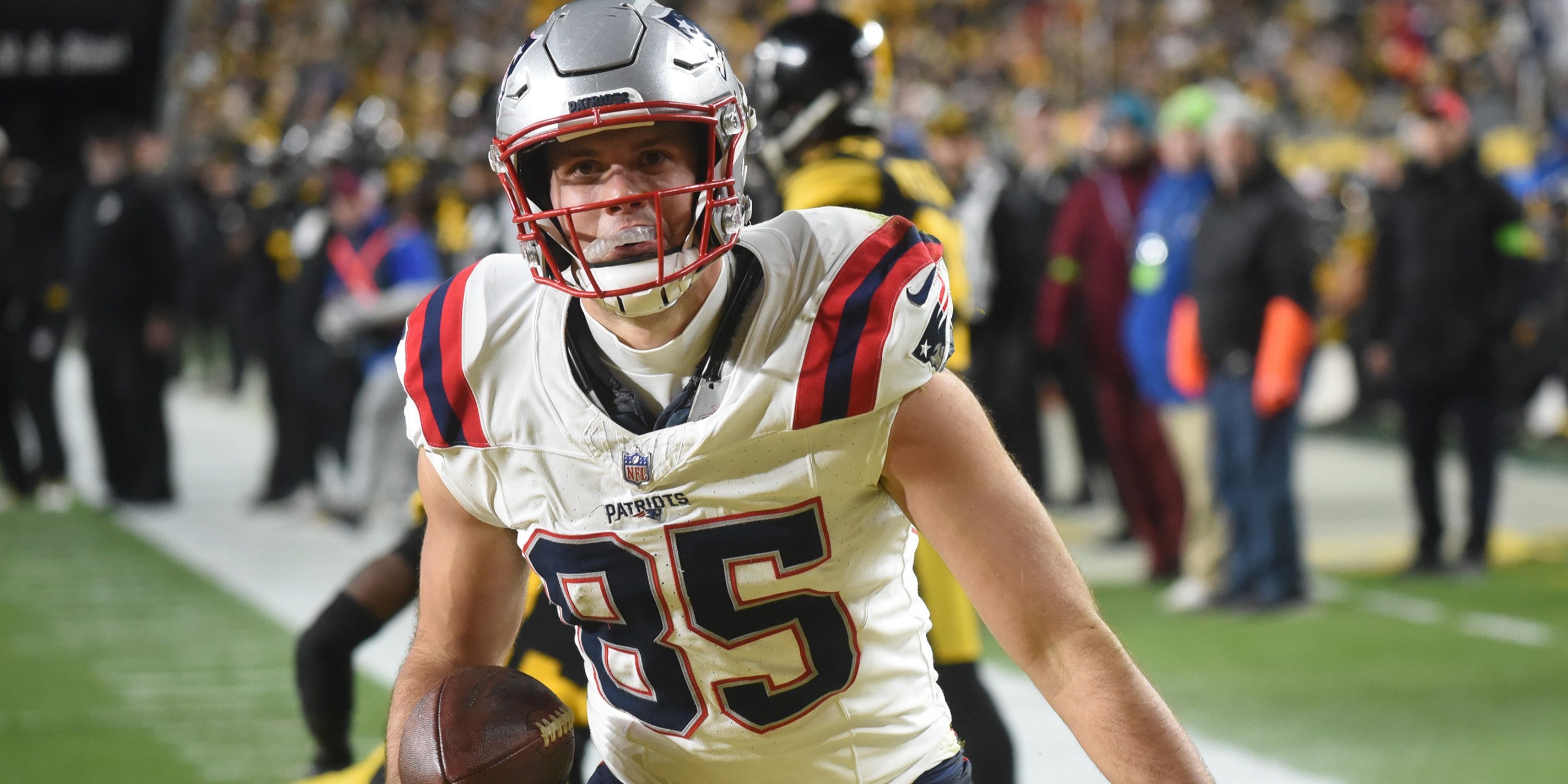 Hunter Henry celebrates after scoring a touchdown