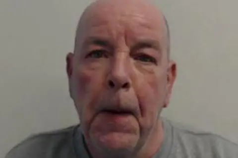 POLICE SCOTLAND A police mugshot of John Higgins