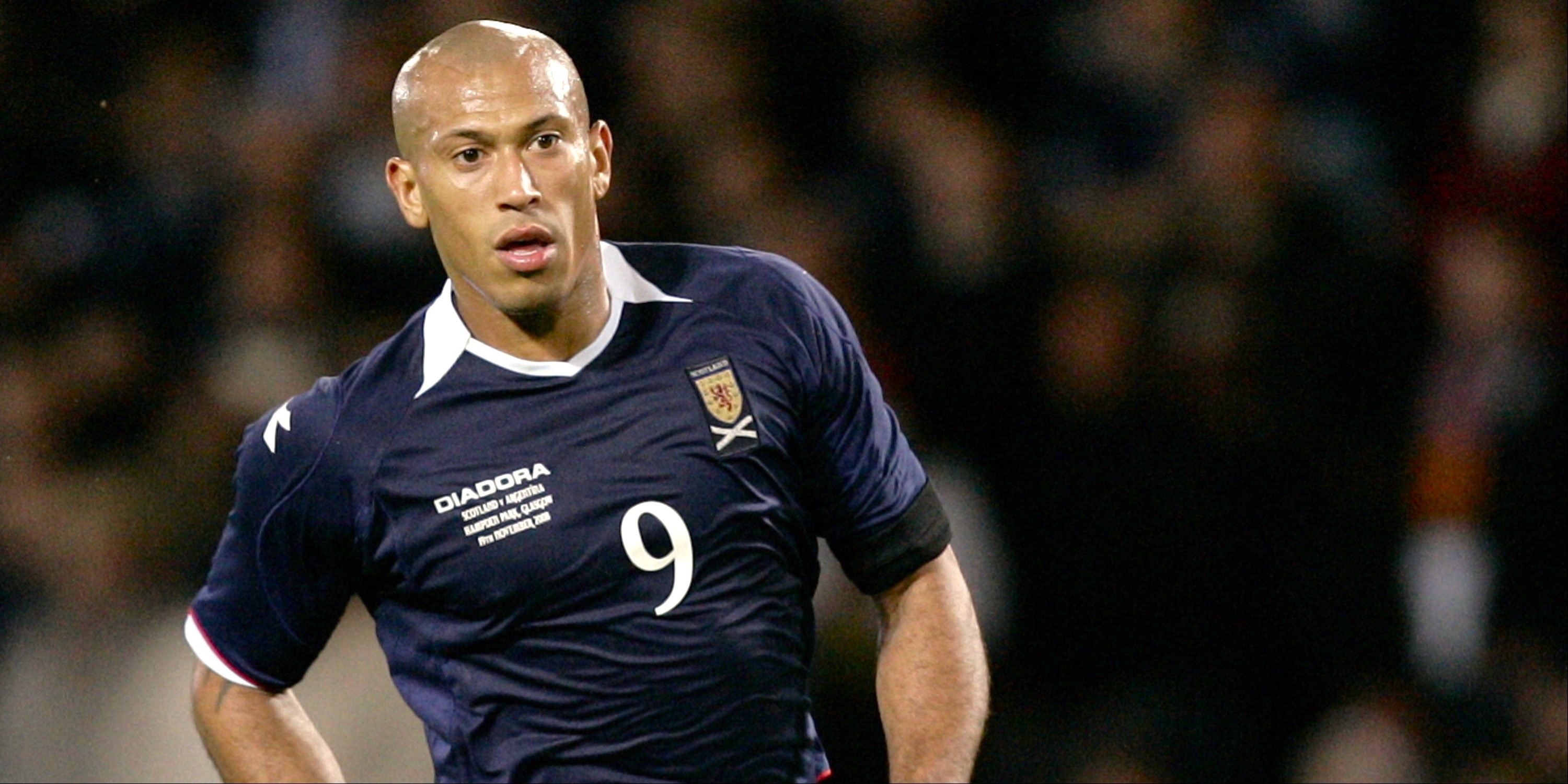 Chris Iwelumo in action for Scotland. 