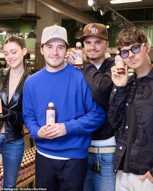 Priced at a steep £15 a bottle, the oldest of the Beckham children has created two flavours, Hot Habanero and Sweet Jalapeno, as well as a range of clothing merchandise (Brooklyn and Nicola pictured with Romeo and Nicola's brother Will)