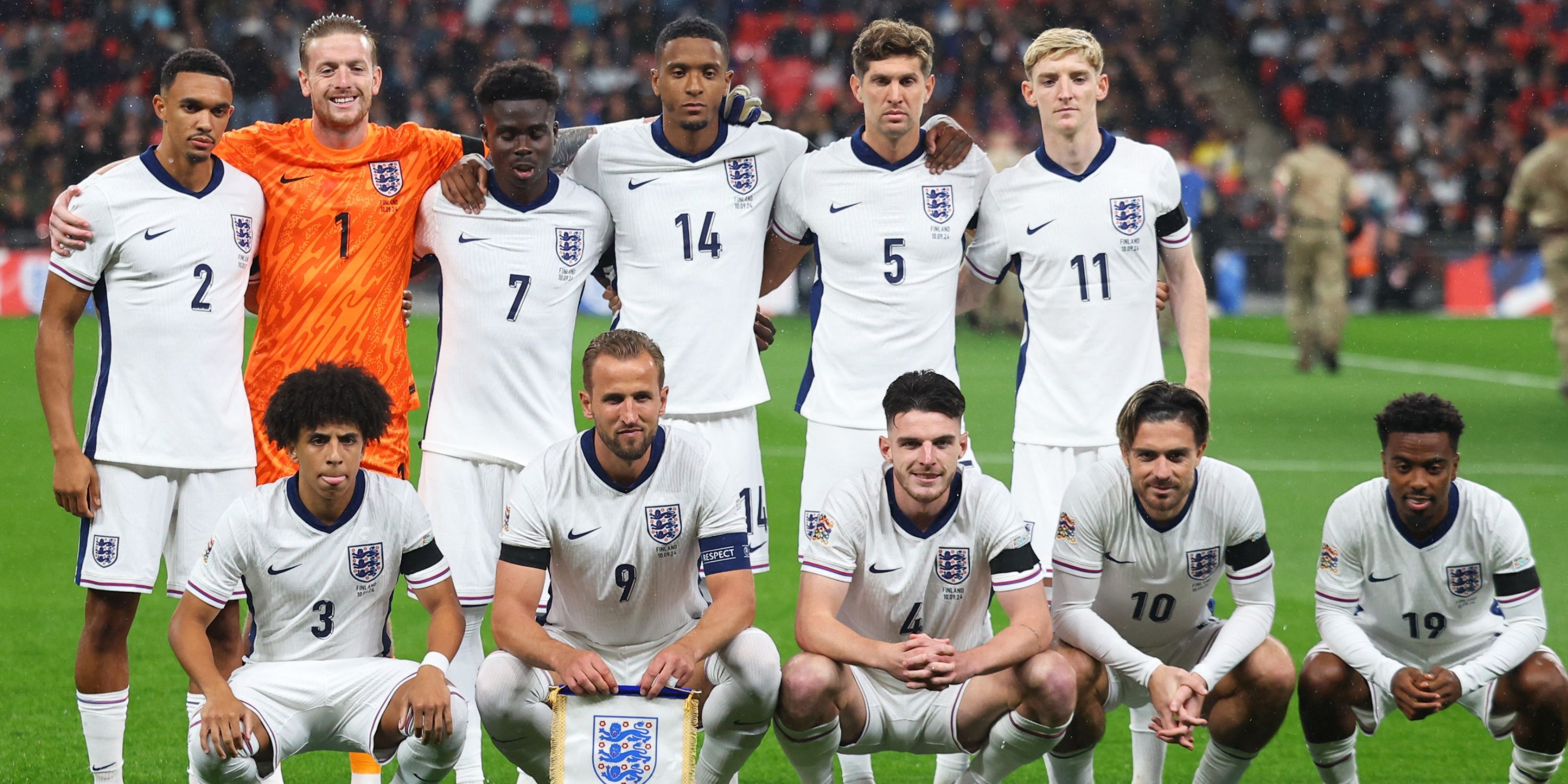 England players pose for a team group photo before Finland match.