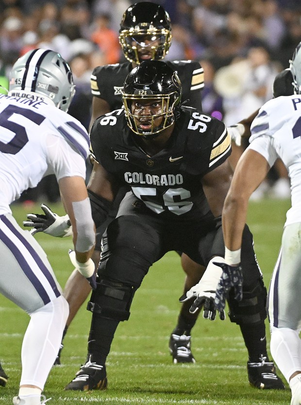 Colorado left guard Tyler Brown blocks against Kansas State at...