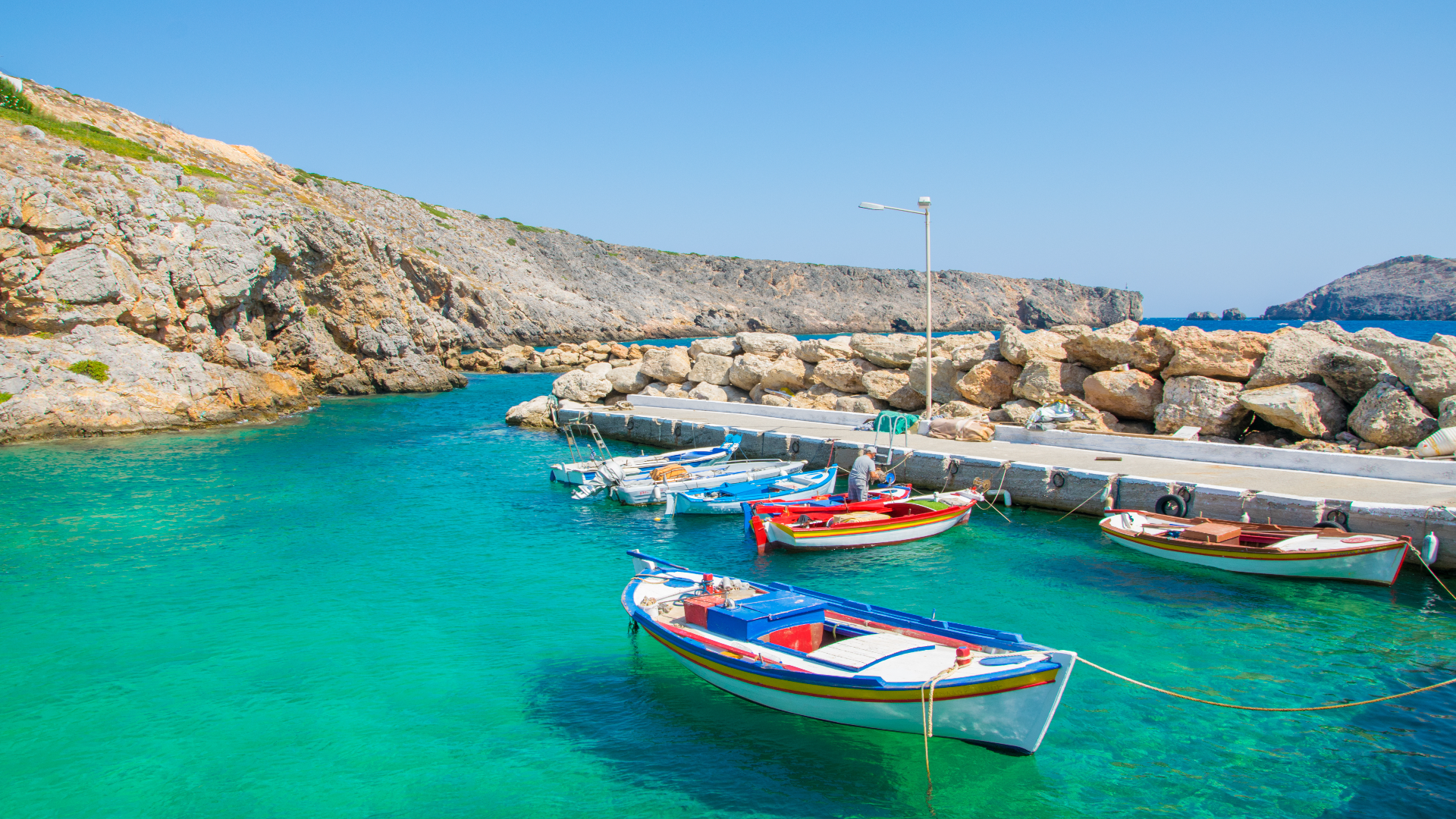Small boats in the port on Antikythera Island in Greece, Europe