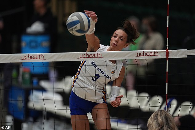 The coach of controversial women's volleyball player Blaire Fleming (pictured) has spoken out