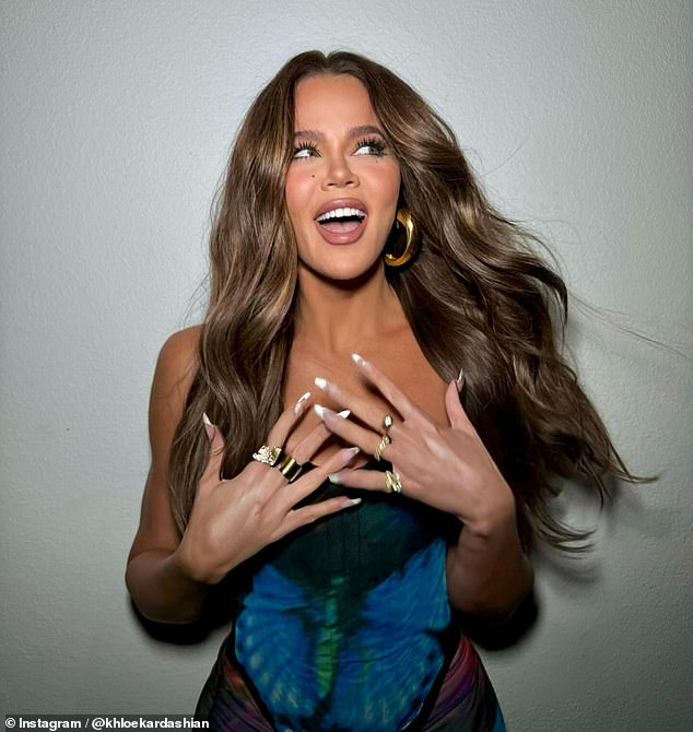 Khloe Kardashian put on a busty display while posing up a storm in her latest glamour shots on Friday