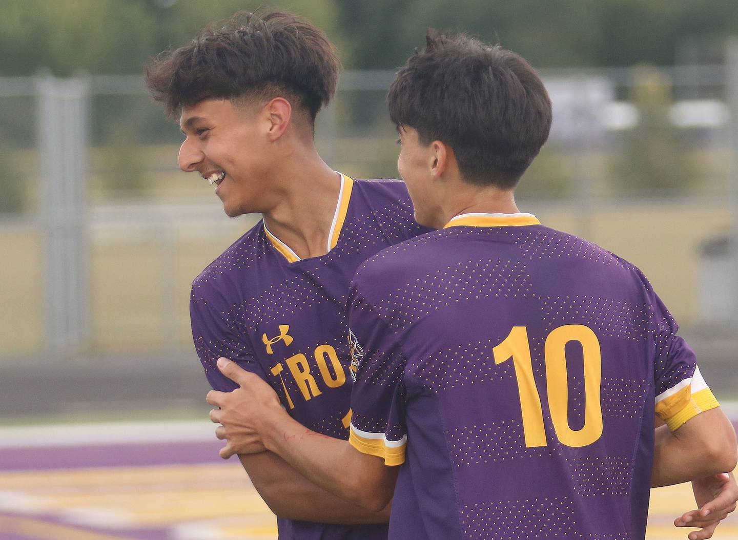 Mendota's Sebastian Carlos congratulates teammate Johan Cortez on scoring a goal over Streator
