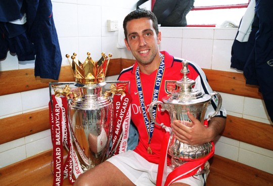 Edu with the Premier League and FA Cup trophies